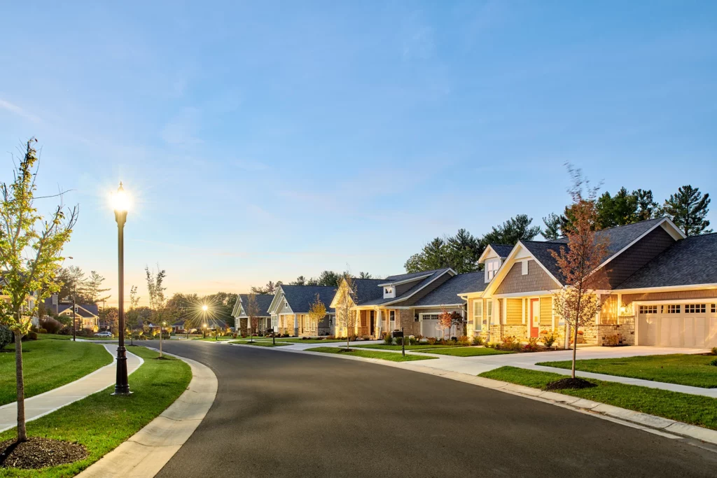 Streetscape with courtyard homes in the evening | The Retreat at Summit Park in Blue Ash, Ohio